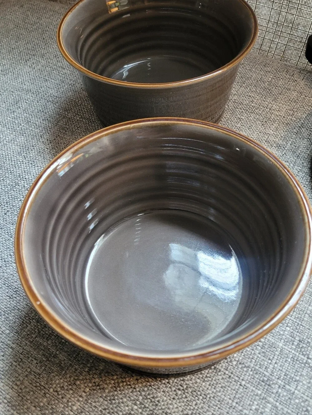Set of Two Baum Brothers TUSCANY Stoneware Bowls in Warm Gray with Brown Rim.